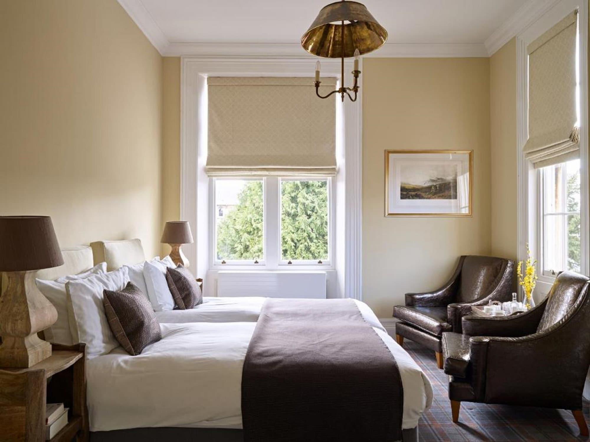 Cotswold Grange Panzió Cheltenham Kültér fotó A room at the hotel