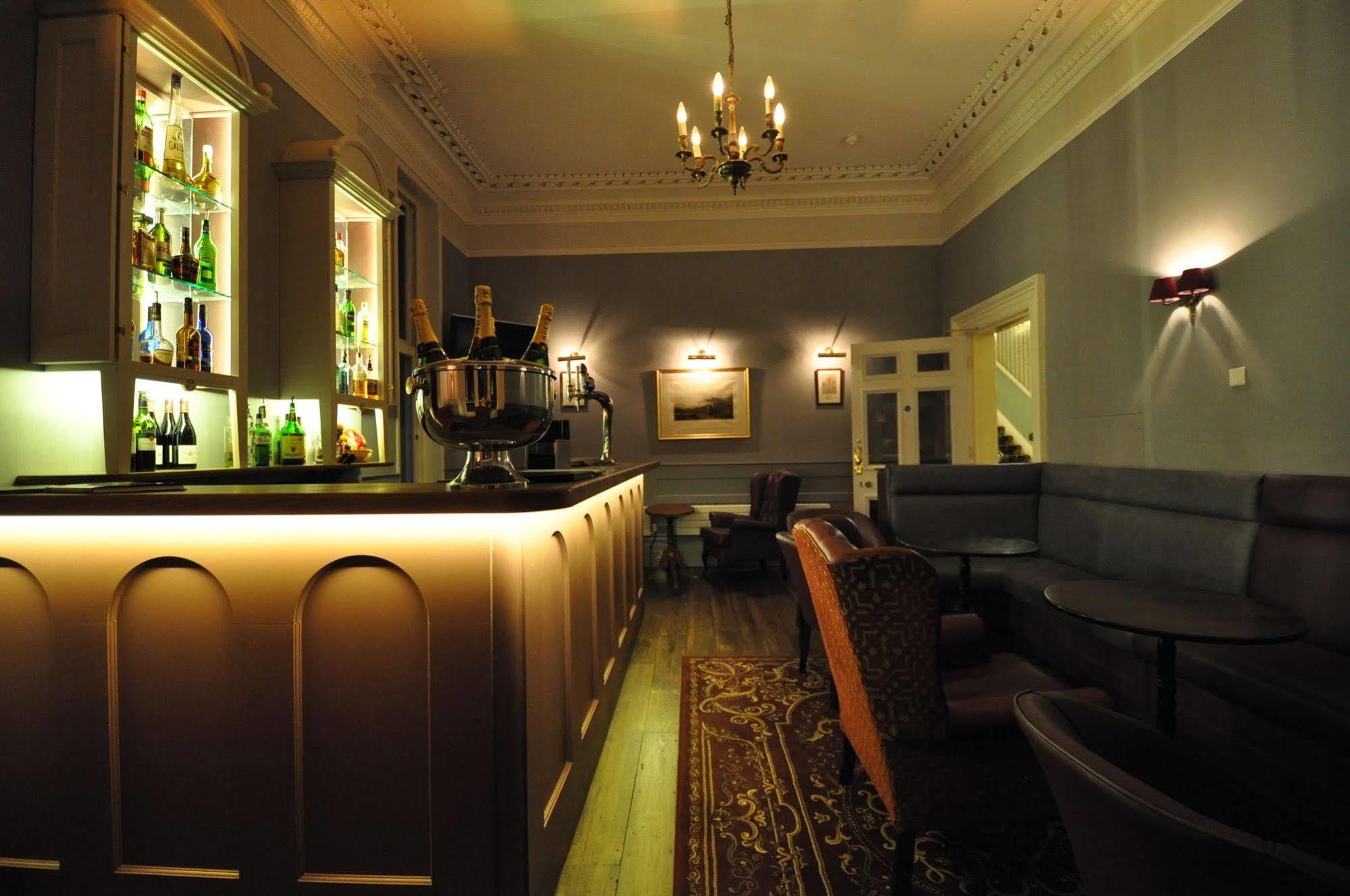 Cotswold Grange Panzió Cheltenham Kültér fotó The bar at the 2018 edition of the Edinburgh International Book Festival